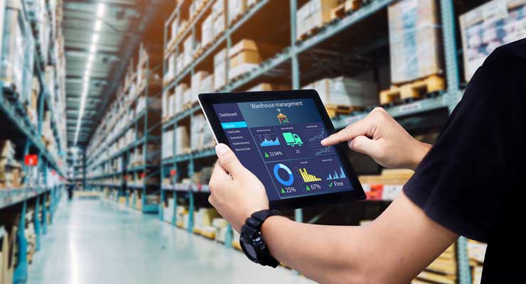 4 Keys to Launching Products at Retail Stores metrics on tablet in a warehouse